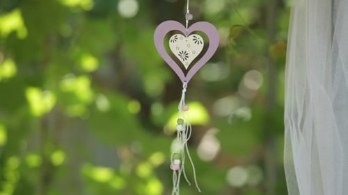 Romantic Heart Decoration Hanging in a Summer Garden