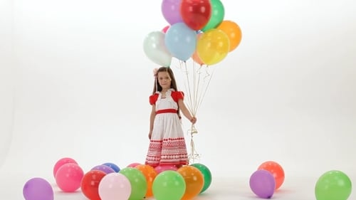Girl Holding Colorful Balloons on Birthday Party