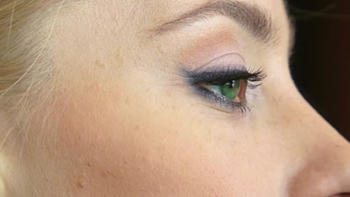 Close Up Of Makeup Application on Person's Face