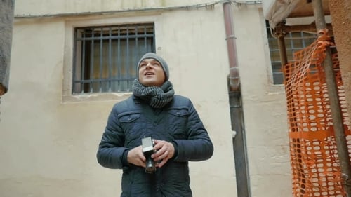 Man With Vintage Handheld Camera