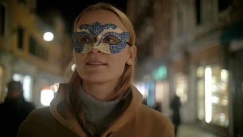 Woman In Carnival Mask Walking In Venice, Italy