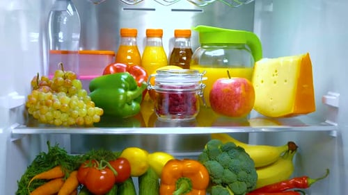 Open Refrigerator Filled with Food