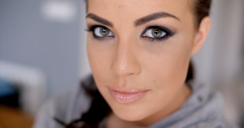 Woman With Dramatic Eye Makeup, Close-Up Portrait