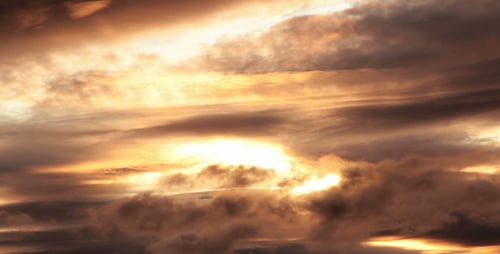 Golden Clouds at Sunrise or Sunset Time Lapse