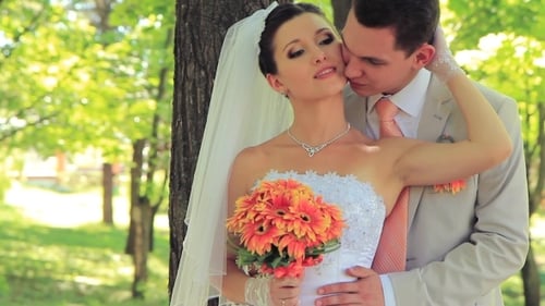 Newlyweds In A Park