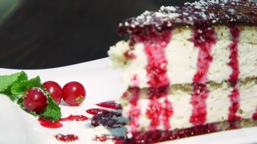 Delicious Slice of Cake with Berries and Mint