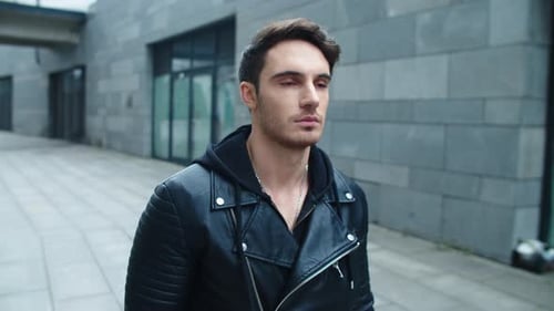 Closeup Brutal Man Walking Street, Handsome Man Moving on Gray Wall Background