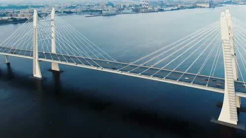 Motion Along Modern Cable-stayed Bridge Against Cityscape