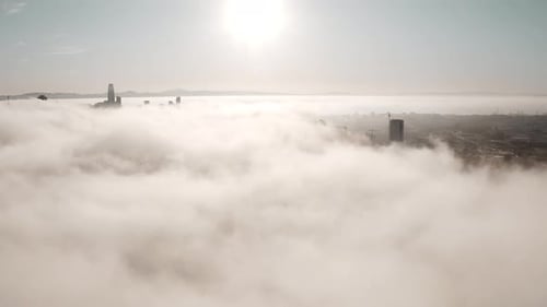 City Under Blanket of Clouds Aerial View