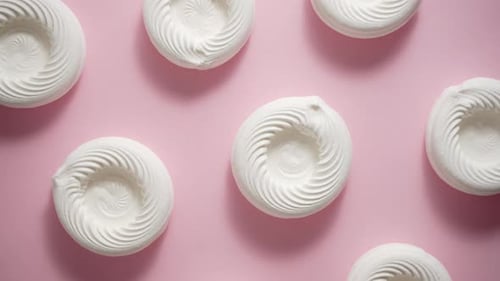 Empty Meringue Nests Placed on a Pink Background