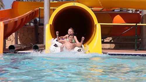 Children Have Fun in Water Park