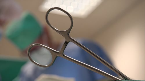 Surgical Scissors in Bright Hospital Operating Room