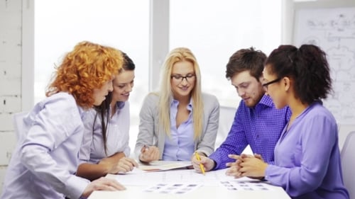 Happy Creative Team Meeting At Office