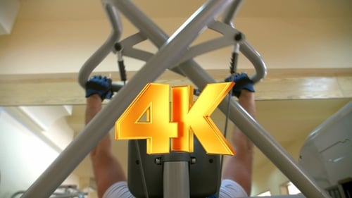 Working Out Arm Muscles on Gym Equipment