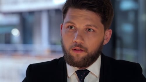 Businessman Waiting For a Meeting In Cafe