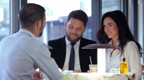 Business Team Meeting at Cafe Table