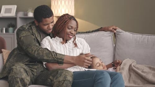 Loving Military Family Resting Comfortably at Home
