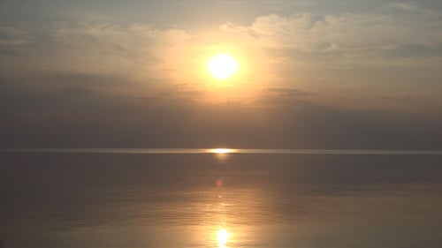 Ocean Sunrise with Golden Light Reflections