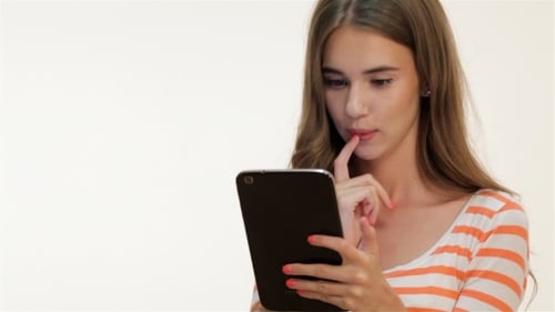 Pretty Young Woman Using Tablet