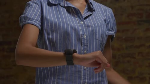Close Up of Person Using a Smart Watch