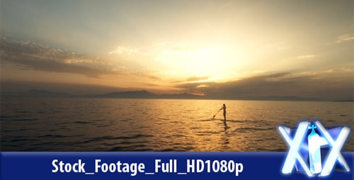 Paddle Boarding Silhouette at Beautiful Sunset