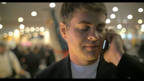 Businessman Having a Phone Talk At The Airport