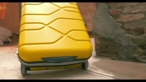 Bright Yellow Suitcase Pulled Through Urban Alleyway