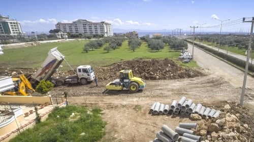 Road Construction Work. High Angle At Dumper