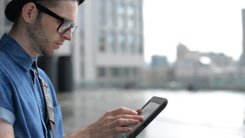 Using Tablet on Street