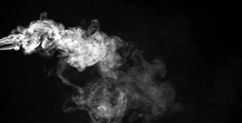 Smoke Billowing Across a Black Background