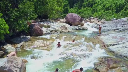 Children Enjoying Tropical River Adventure on Summer Day