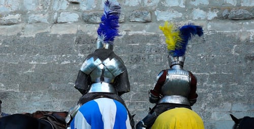 Two Knights in Shining Armor on Horses