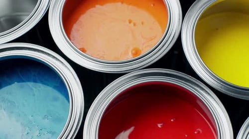 Opened Metal Can with Colors Paint Top View