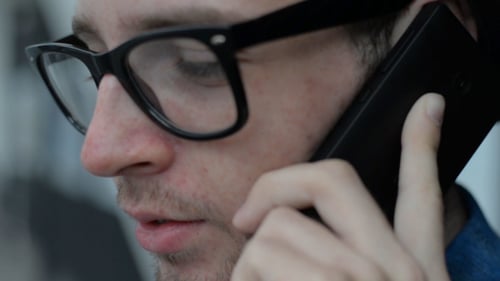 Man Talking on Smartphone Close Up