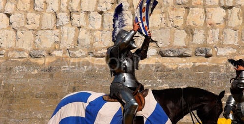 Knight in Armor on Horseback Preparing for Tournament