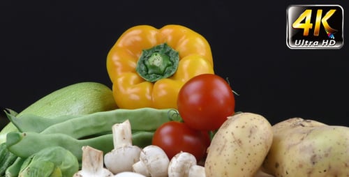 Display of Fresh Raw Vegetables on Black Background