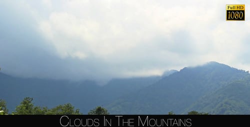 Scenic Mountains Under Cloudy Sky