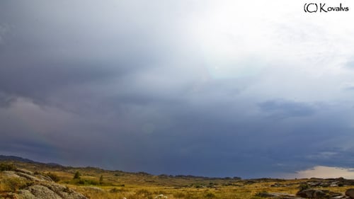 Wild Landscape With Rock And Clouds