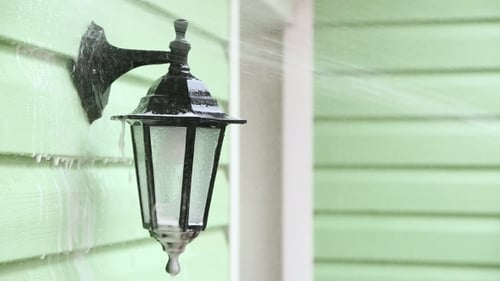 Jet Of Water Washing Foam Off Street Lamp