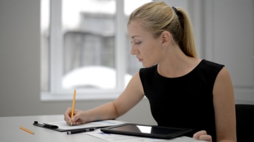 Office Girl Working in Office Using Tablet
