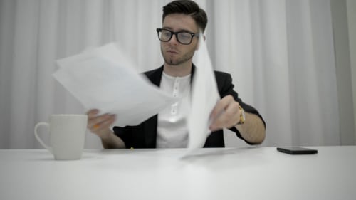 Man After Work Collecting Documents
