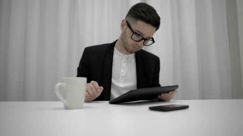 Man Using Tablet