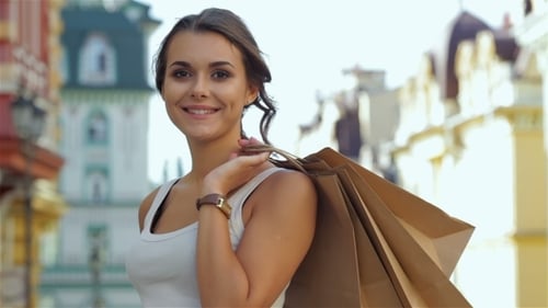 Beautiful Girl Walks Down The Street
