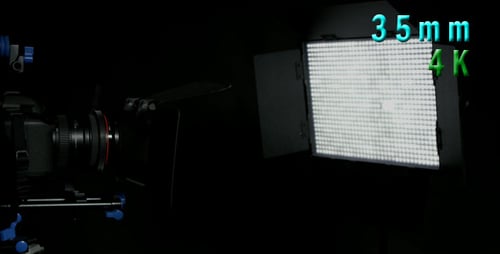 Camera with Bright LED Light Panel in Studio