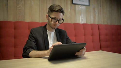 Modern Man Using Tablet