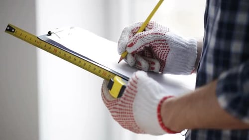 Close Up Of Man With Measuring Ruler And Clipboard 7