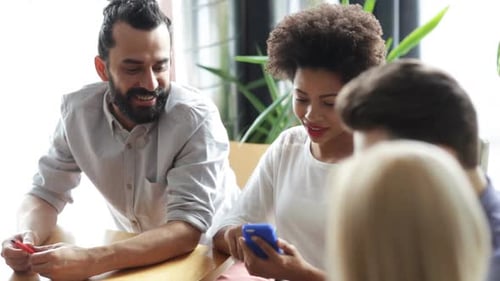 Friends With Smartphone And Tablet Pc In Office 1