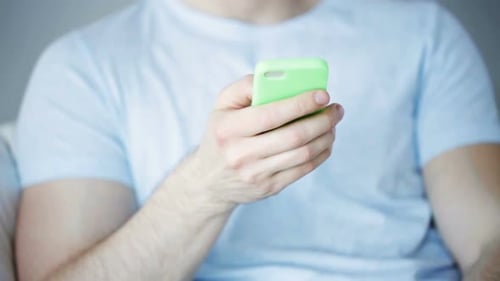 Close Up Of Man With Smartphone Texting At Home 5