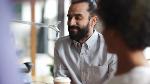 Happy Creative Team Drinking Coffee In Office 29