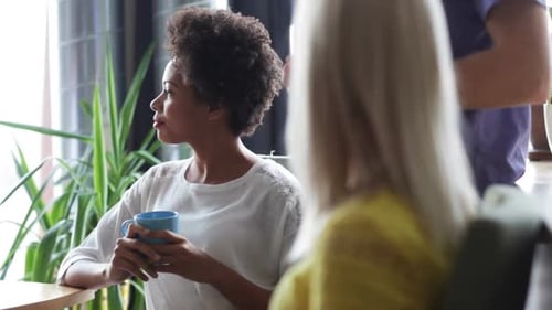 Happy Creative Team Drinking Coffee In Office 30